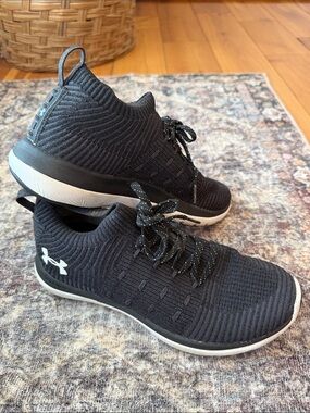 Under Armor brand running shoes, size 8